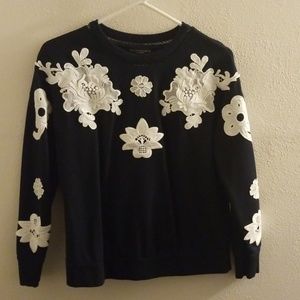Designer sweater